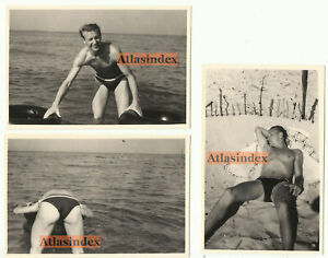 Foto Junger Mann Gay Boys mit Dreieckbadehose und Schwimmreifen Ostsee 1970er