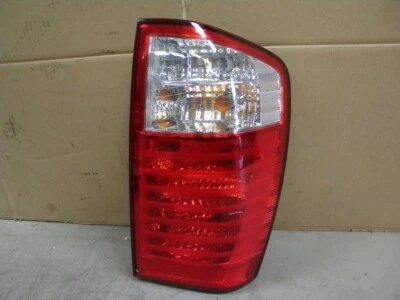 Kia Sedona LX 2006 montaje de luz trasera de fábrica luz de freno del lado derecho del pasajero Foto 1 de 4