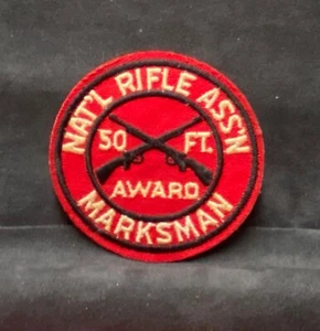 Parche bordado NAT’L RIFLE ASSN MARKMAN PREMIO 50 FT ~ Rifles cruzados ~ Disparos - Imagen 1 de 2