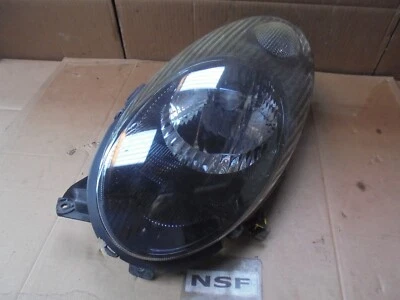 FARO LUZ DELANTERA LADO PASAJERO NISSAN MICRA K12 C+C 2007 Foto 1 de 4