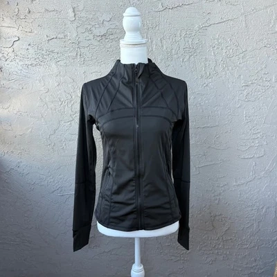 Chaqueta deportiva gris con cremallera completa cuello falso ropa deportiva capa de rendimiento para mujer Foto 1 de 4