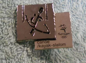 2000 OLYMPIC SPORTS METAL BADGE - CANOE / KAYAK-SLALOM - Picture 1 of 2