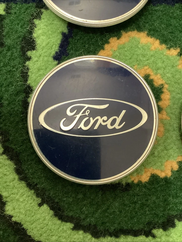 Tapacubos central Ford Focus 2005-08 y Taurus 2010-12 97BG 1000 AD 1 pieza Foto 1 de 4