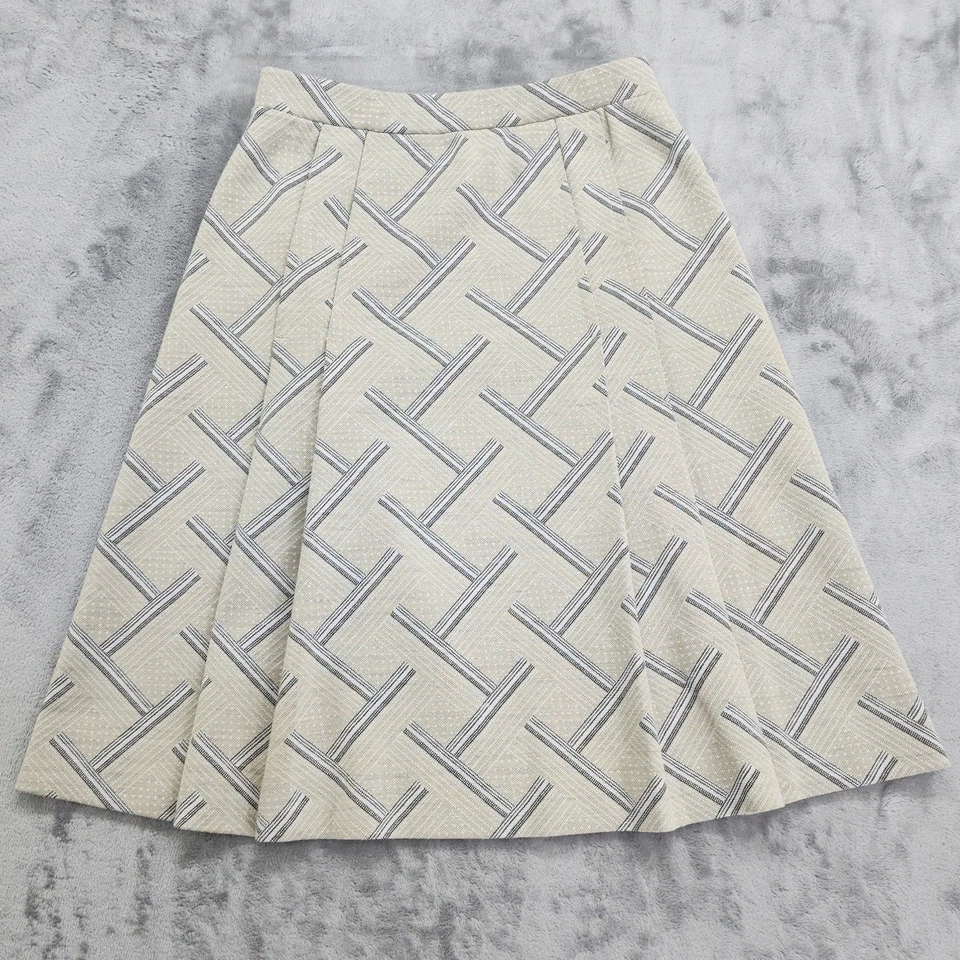 Falda Jantzen vintage años 70 para mujer S beige negra plisada geométrica línea A preppy Foto 1 de 4