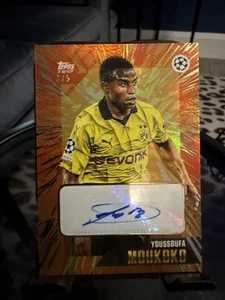 TOPPS GOLD 23/24 X LÁTIGO — Youssoufa Moukoko Automático — - Numerado 02/05 - Dortmund - Imagen 1 de 5