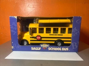 The Chevron Cars Sally School Bus with Removable Roof 2001 NIB Damaged Box - Picture 1 of 12