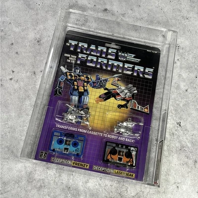 Vintage G1 Transformers Frenzy & Laserbeak Graded AFA 70 MOC Sealed 1985 - Image 1 of 4