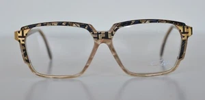 Anteojos Cazal Vintage - NOS - Modelo 334 - Col. 704 - Dorado y Mármol Púrpura y Ámbar - Imagen 1 de 3
