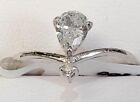 .56ct Pear Cut Diamond with .02ct round accent Diamond. Tested. 