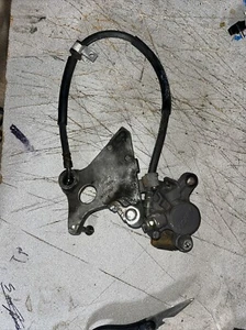 1996 Honda CBR 900 RR OEM REAR BACK BRAKE CALIPER & BRACKET - Picture 1 of 10