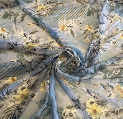 Tela transparente de gasa multicolor azul y amarillo con estampado floral - por yarda Foto 1 de 2