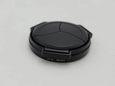 Genuine Ricoh LC-2 Self-Retaining Plastic Auto Open Lens Cap for S10 P10 - Image 1 of 3