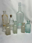Lot vintage de 7 bouteilles en verre transparent et teinté pharmaceutique beauté médicale