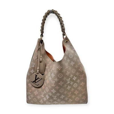 Bolso de Mano Louis Vuitton Carmel Edición Especial Modo Vuelo Mahina Cuero Beige Foto 1 de 4