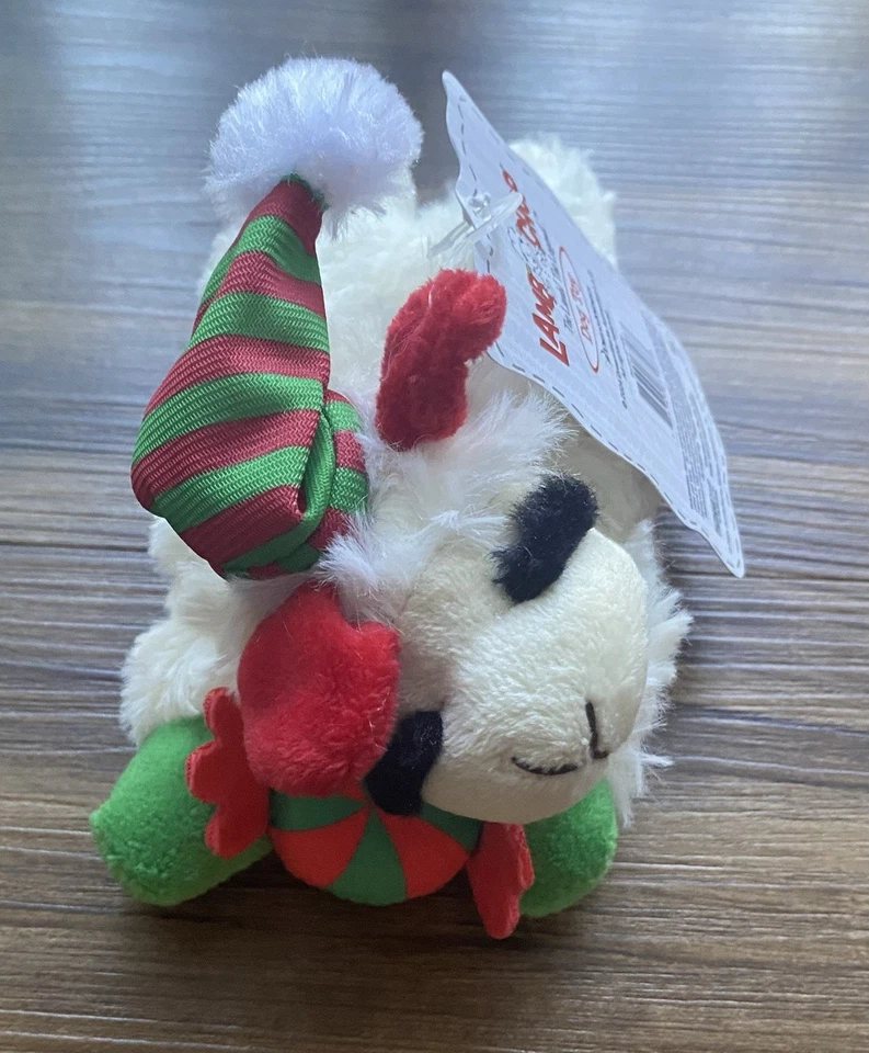 Multipet 6 Inch Holiday Lamb Chop With Red And Green Hat And Ball With Squeaker - Image 1 of 1