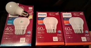 12 Philips A19 -4Soft White,8- Daylight LED Bulbs New And Tested - Picture 1 of 2