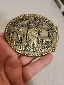 National Finals Rodeo Hesston 1982 NFR Adult Goldtone Western Belt Buckle *NICE  - Picture 1 of 5