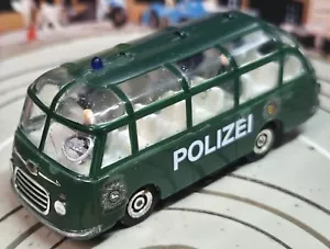 Modélisme ferroviaire H0 Slotcar Racing ~~ Setra Police Bus avec moteur à ancre plate #EBS1468 - Photo 1 sur 3