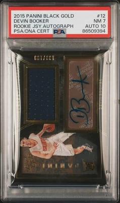 Camiseta deportiva de novato 2015-16 Panini negra dorada 12 Devin Booker/199 PSA 7 automática 10 radiocontrol Foto 1 de 3
