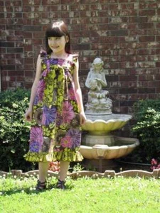 LN~BOUTIQUE~CUSTOM~RESALE~FLORAL DRESS~RUFFLED~BOW~SIZE 10 - Picture 1 of 4
