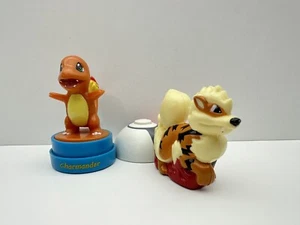 Pokemon Spielzeug 2 Stück Arcanine Pokeball Shooter Burger King & Roseart Charmander - Bild 1 von 5