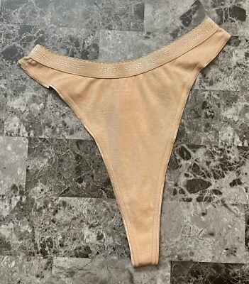 NUEVO CON ETIQUETAS BRAGAS TANGA VICTORIA'S SECRET PEQUEÑAS BEIGE NUDE 100% ALGODÓN RARAS VINTAGE Foto 1 de 4