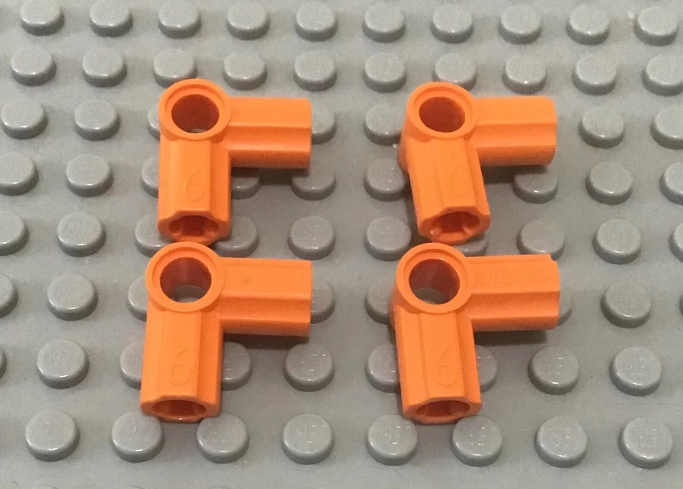 LEGO 4 Orange Technic, Axle and Pin Connector Angled #6 - 90 degrees, Part 32014 - Image 1 of 1