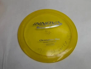 Innova Champion Orc Disc Golf Distance Driver 164g Yellow Old Run Penned - Picture 1 of 13