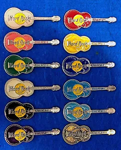 12 FARBEN REYKJAVIK ISLAND AKUSTIK GIBSON GITARREN GOLD Hard Rock Cafe PIN SET - Bild 1 von 2