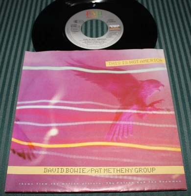 DAVID BOWIE / PAT METHENY - This Is Not America  (1985 7" Import 45 Vinyl + PS) - Image 1 of 2