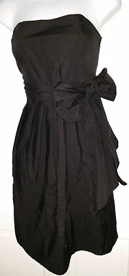 Vestido lazo perforado de encaje con ojales sin tirantes de algodón negro Rhapsody. L Foto 1 de 4