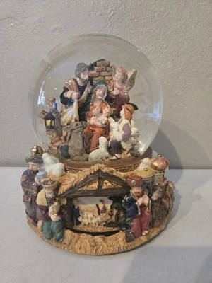 Kirkland Christmas Musical Water SnowGlobe Revolving Base Toy Shop Plays Toyland - Image 1 of 4