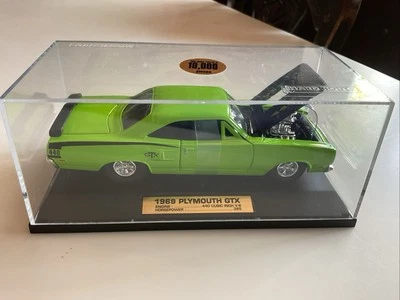 TootsieToy 1969 cuerpo duro Plymouth GTX 1:32 con estuche de plástico fundido a presión Foto 1 de 4