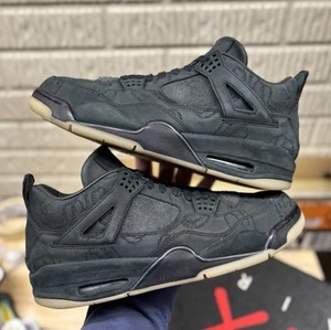 Size 12 - Jordan 4 Retro x KAWS Black 2017 - Picture 1 of 10