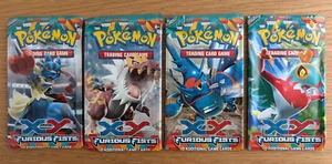 XY Furious Fist ~ Booster (No Cards) Pack Wrappers ~ All 4 Artworks!! - Picture 1 of 2
