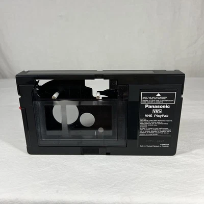 Adaptador Panasonic VHS-C a VHS PlayPak para convertidor motorizado VCR VYMW0009 Foto 1 de 4