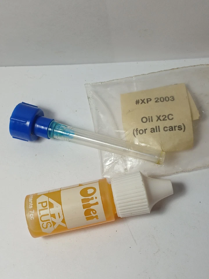 1 pieza 1981 Aurora HO Slot Car AFX PLUS aceite especial de carreras con micro aguja Foto 1 de 4