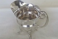 A STUNNING ANTIQUE SOLID STERLING SILVER EDWARD VII CREAM JUG BIRMINGHAM 1909.