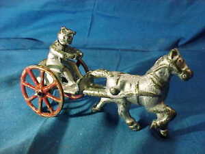 Early 20thc TROTTING HORSE + SULKY w DRIVER Cast Iron TOY by Kenton
