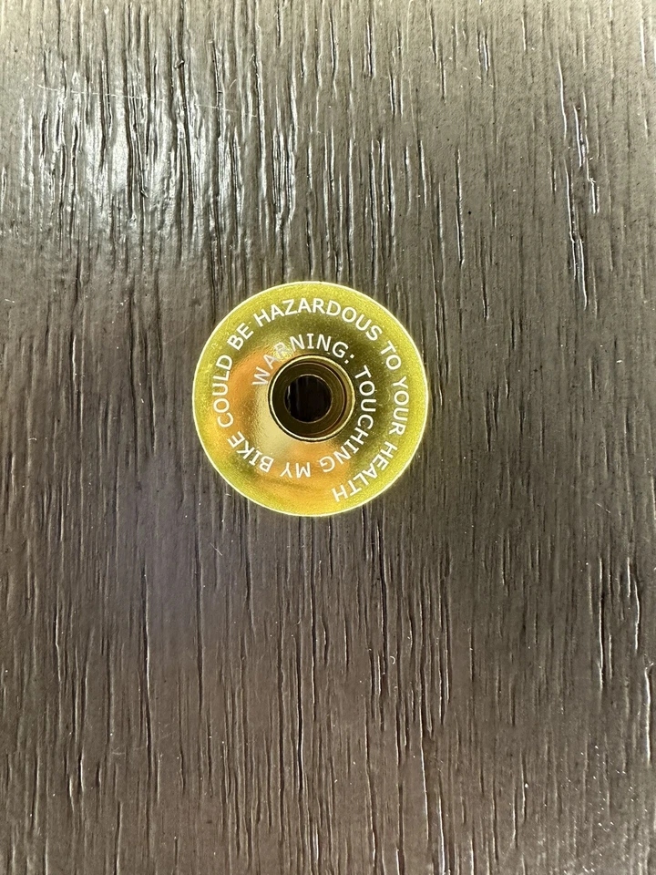 Touching My Bike Could Be Hazardous Bicycle Headset Stem Top Cap 1 1/8" Gold - Image 1 of 1