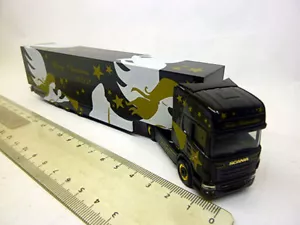 301381 Herpa 1:87 Scania R TL Koffer-Sattelzug Herpa Weihnachtstruck 2012 - Bild 1 von 2