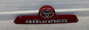 OEM 2014-2024 TOYOTA 4RUNNER REAR LIFTGATE FINISH PANEL GARNISH W/ EMBLEM - Picture 1 of 8