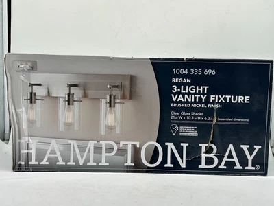 Hampton Bay Regan 21 pulgadas Luz de tocador de baño de níquel cepillado de 3 luces nueva Foto 1 de 4