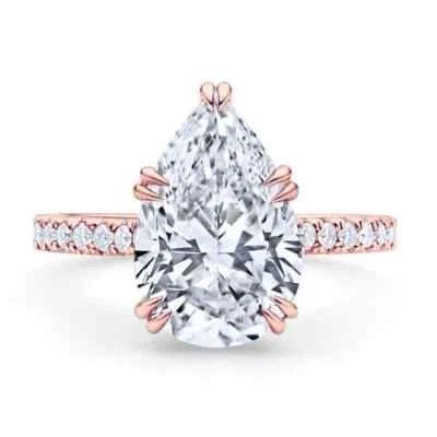 Anillo de boda de compromiso de moissanita talla pera de 3,0 quilates de oro rosa macizo de 14 quilates Foto 1 de 4