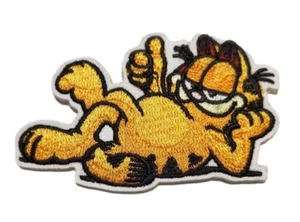 Garfield Character Lying Down 2.75 Inches Wide Embroidered Iron On Patch - Picture 1 of 1