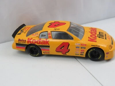 Coche de carreras Chevy NASCAR 1995 Sterling Marlin #4 Racing Champions 1/64 película Kodak Foto 1 de 4