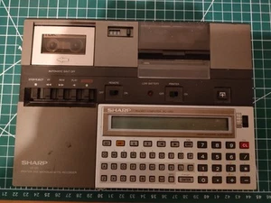SHARP PC 1251 avec CE-125 imprimante,lecteur micro K7 / équivalent TRS-80 PC-3 - Photo 1/5
