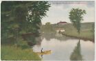 SOUTH HAVEN, MICH. POSTCARD The Black River, Man in Rowboat, Bldg. in Distance