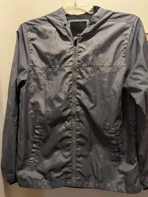 Chaqueta cortavientos Hurley gris medio con capucha cremallera completa para mujer Foto 1 de 4