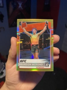 2021 Donruss Optic Rated Rookie UFC TRUE GOLD /10 #206 Brandon Moreno - Picture 1 of 2